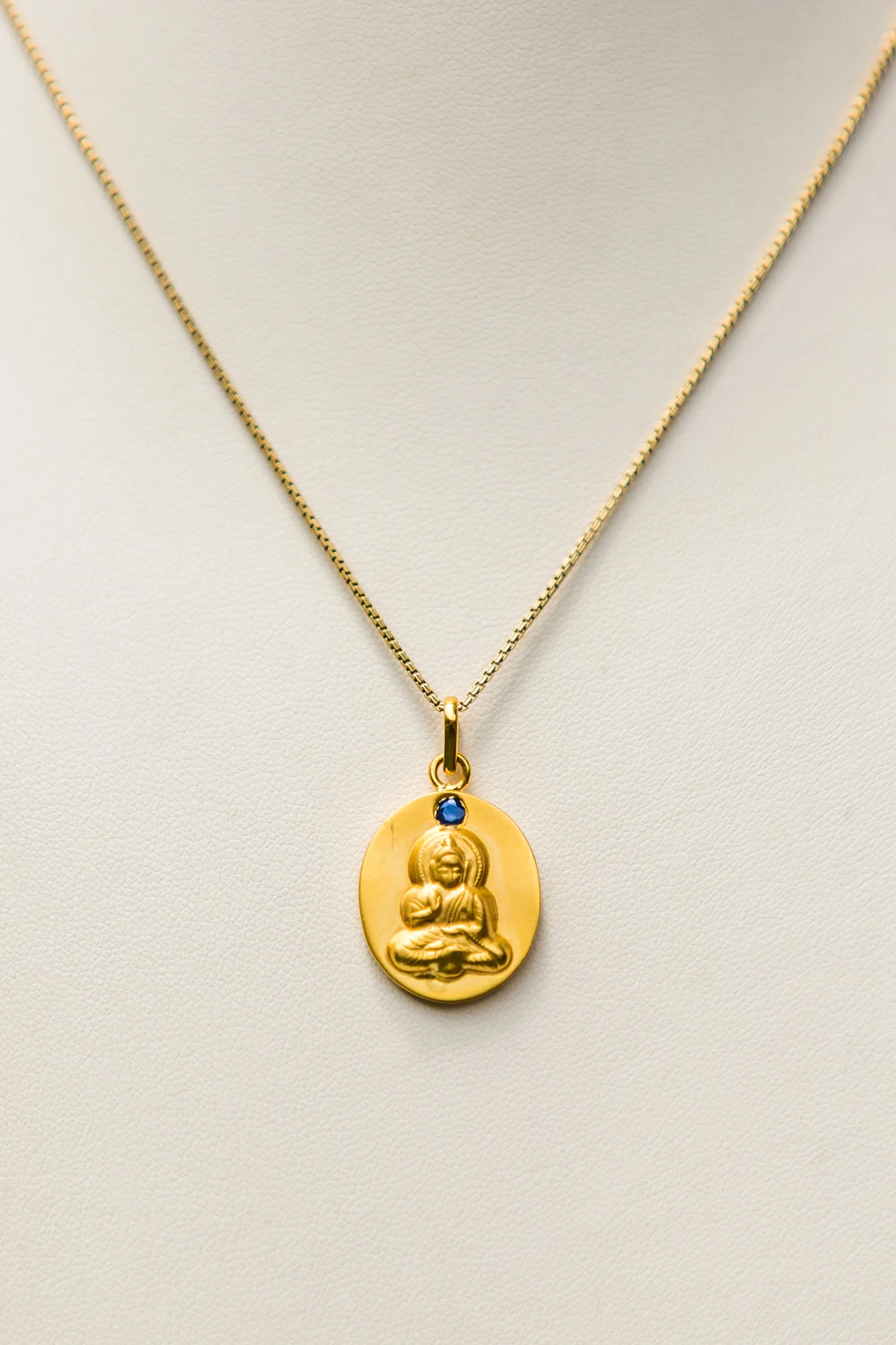 18kt Gold Buddha Istha Devata Pendant with Blue Sapphire Mount