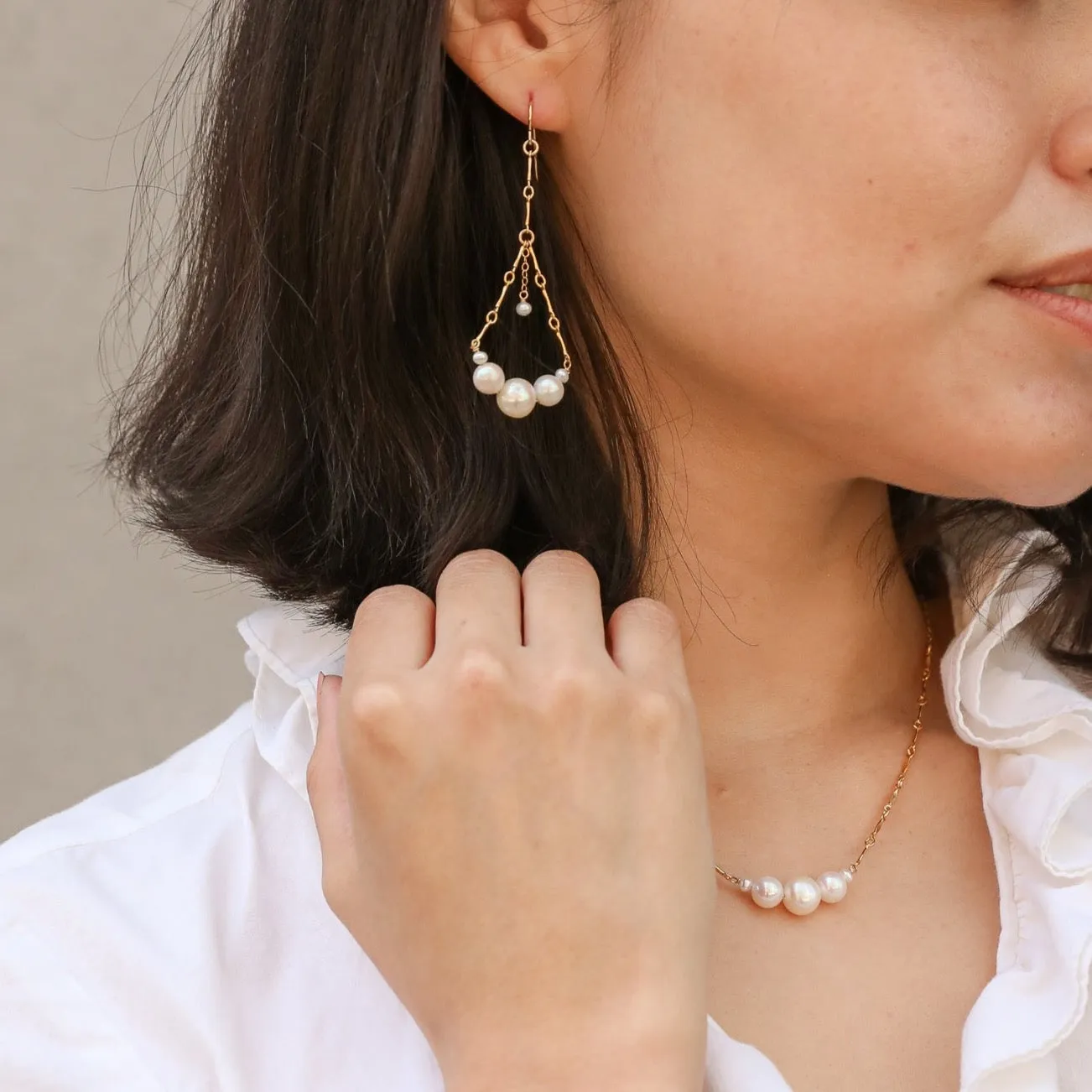 graduated pearl chandelier earrings