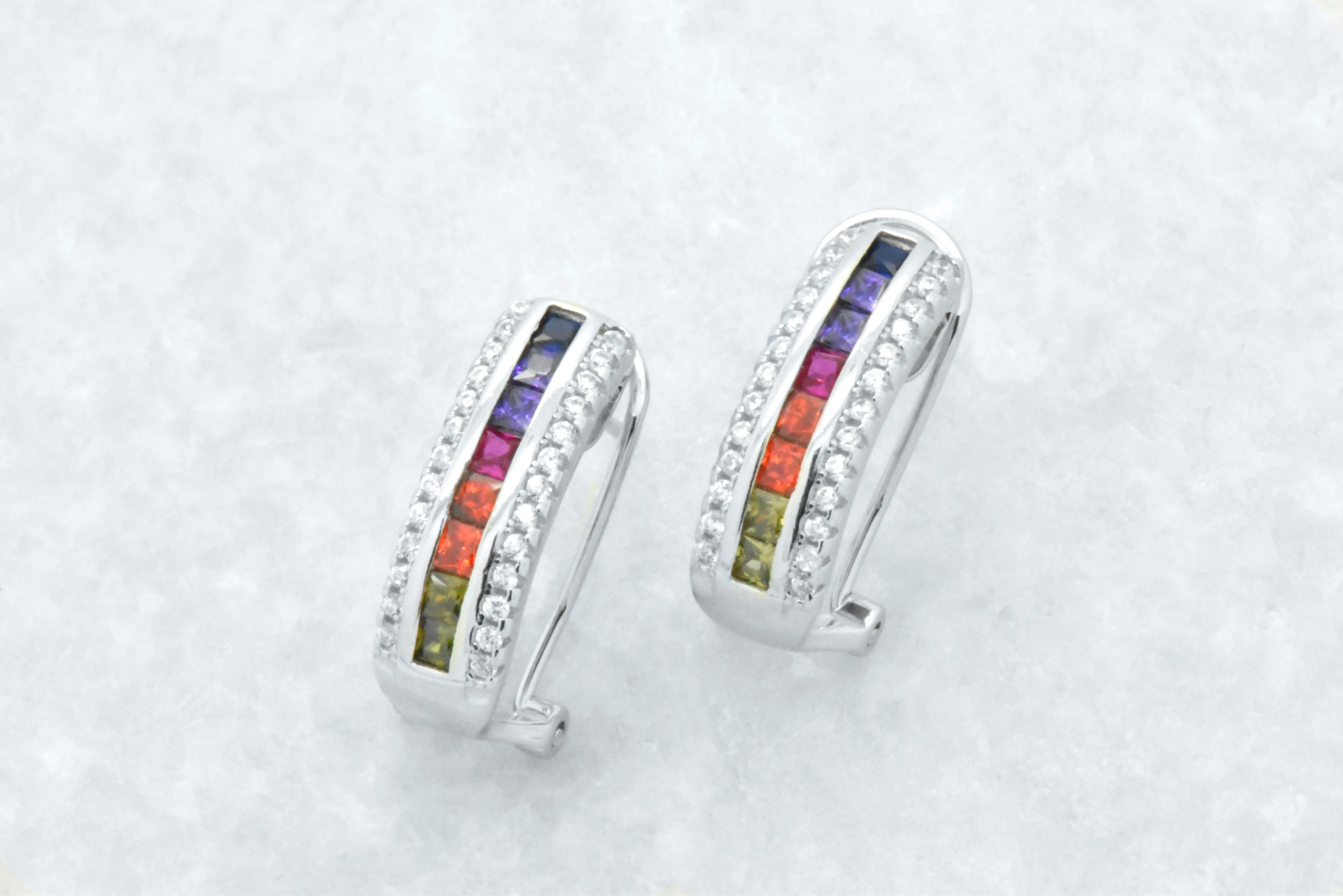 Sterling Silver Rainbow Created Sapphire 3 Row Omega Earrings