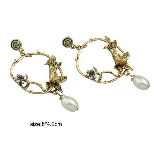 Vintage 3D bird pearl drop earring