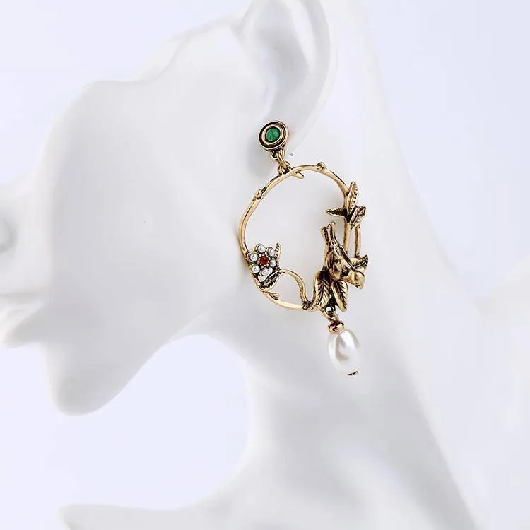 Vintage 3D bird pearl drop earring